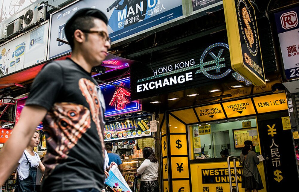 Currency Exchange Bureaus in Hong Kong, China (Xaume Olleros/Bloomberg).